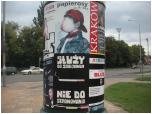 (82/107): Warszawa na spacerze - antyreklama papierosów przyciągnęła uwagę i obiektyw Mariana.<br>2008-08-05